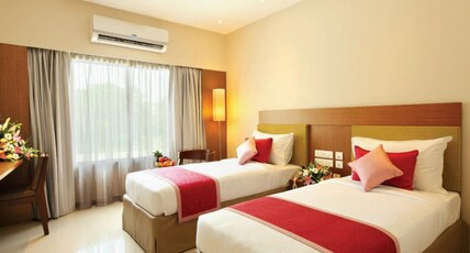 J K Residency Cheruvathur Room Type - Deluxe Twin Bed AC