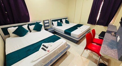 Hotel Pandit Palace Room Type - Family Room - 2 King Bed Hotel Pandit Palace Room Type - Family Room - 2 King Bed