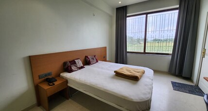 Hotel Radhika NX Room Type - AC DELUXE ROOM