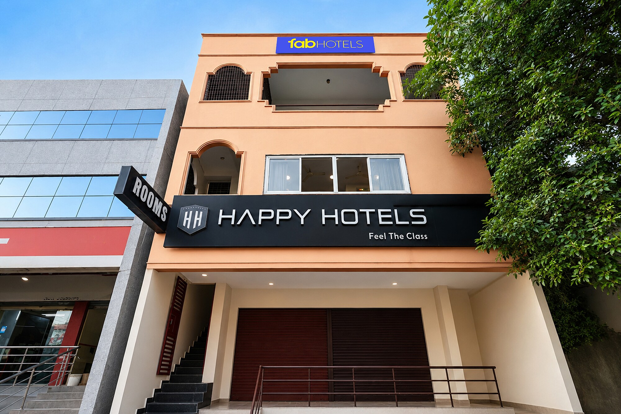 FabHotel Happy - Tap to explore photos