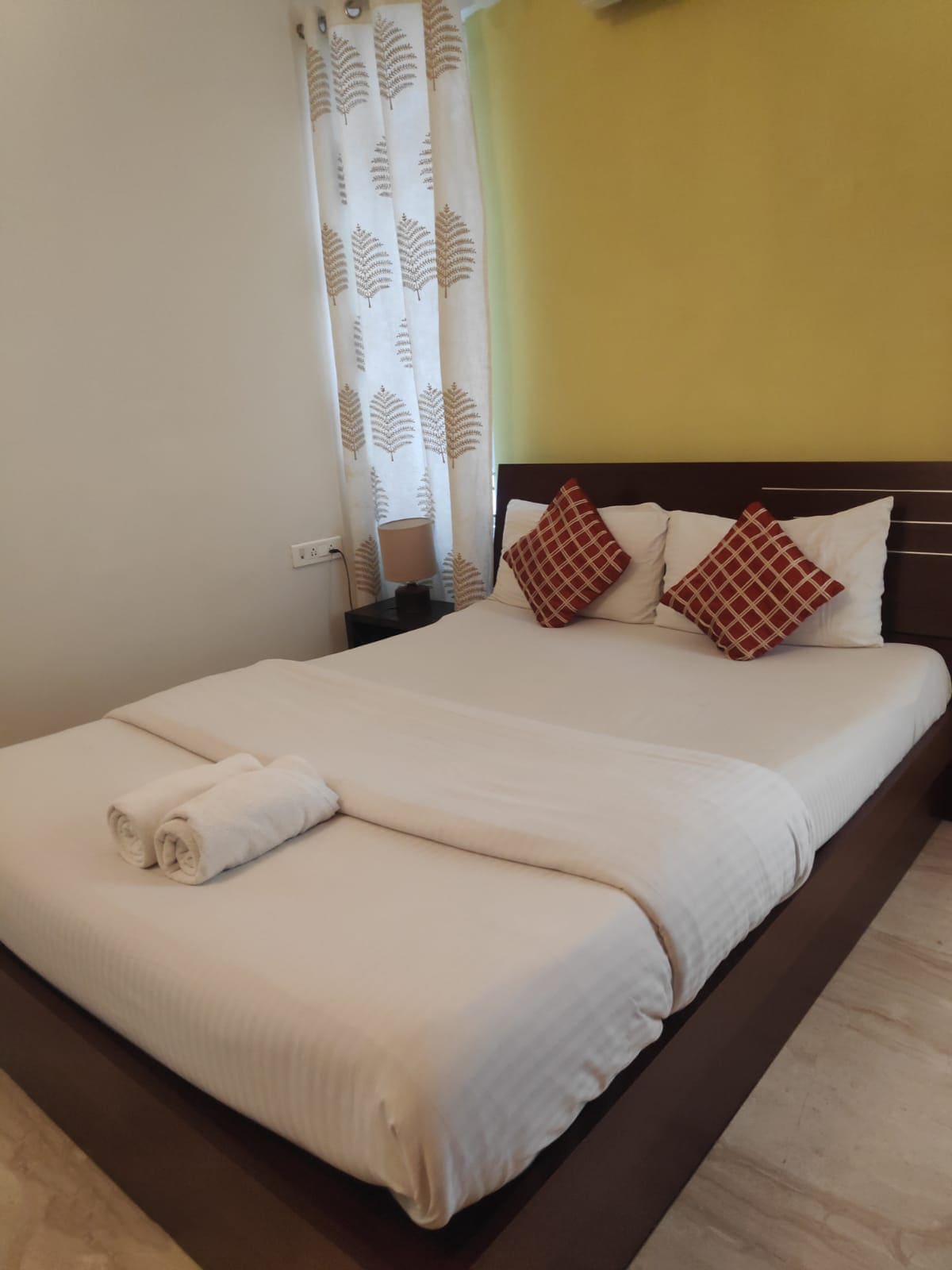 Ixora Suites (Near 100 Ft Rd & Indiranagar Metro Station) - Tap to explore photos