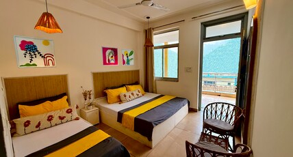 BUNK HOSTEL RISHIKESH Room Type - Triple Bed Room with balcony and Mountain View