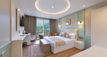 HOTEL VELVET VISTA Room Type - Deluxe Balcony Room with AC