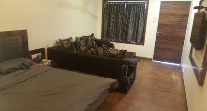 Hotel Rahil Plaza Room Type - POOL SIDE COTTAGE AC  with Balcony (2 adults + 2 child  till 10 yrs )