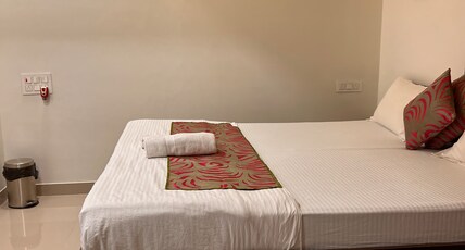 Pinaki Comfort Stay | Rooms & Caretaker Room Type - Deluxe Room