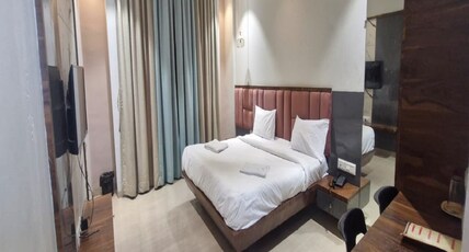Kesar Inn Banquet and Lodging Room Type - Deluxe Room AC