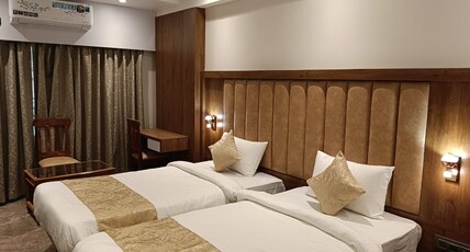 HOTEL FLYSKY ROOMS AND BANQUETS Room Type - Deluxe Room
