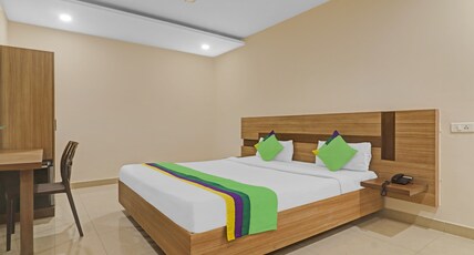 Treebo Pride Inn Botanica Room Type - Deluxe Room