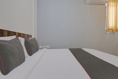 Rooms of Hotel O by OYO Dhruvas Residency
