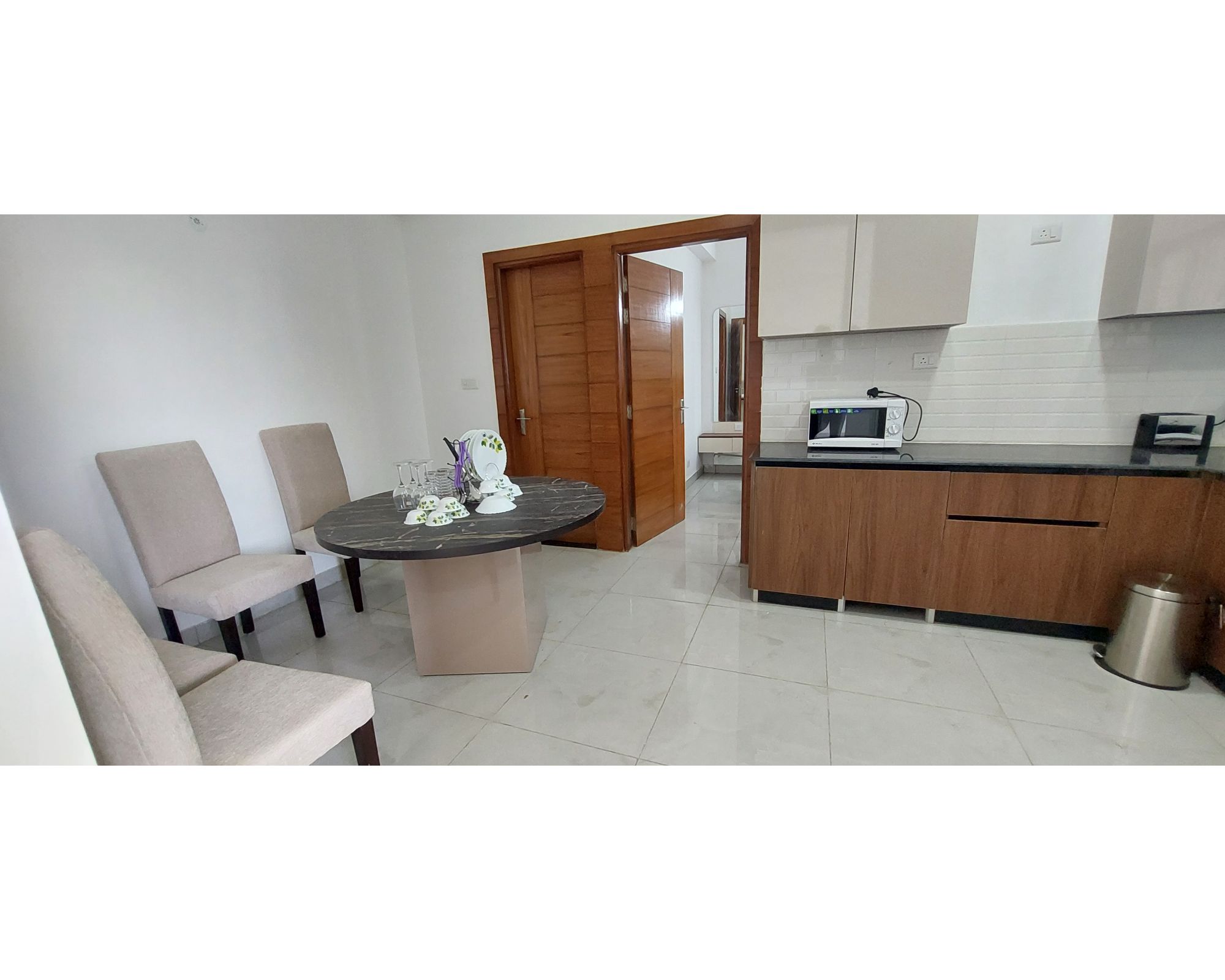 Entire Top Luxury 2 BHK in Mall by Taj Studios - Tap to explore photos