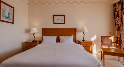 Continental Plaza Beach Resort Room Type - 1 King 2 Twin Family Room Pool view Balcony