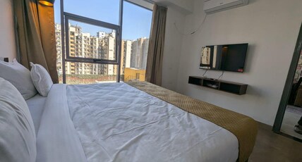 Nimantrana Luxury Suites with Pool  | 5 mins Walk from Sector 75 Metro  Room Type - Suites Room