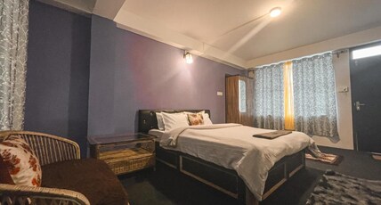 Grand Casa Room Type - Triple room with mountain view and balcony