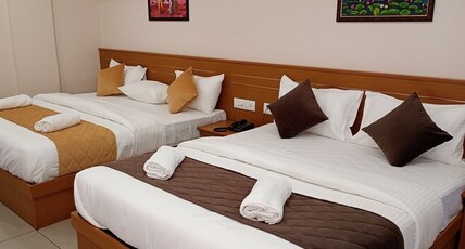 CHOTTANIKKARA AMMA RESIDENCY Room Type - Family Twin bedroom