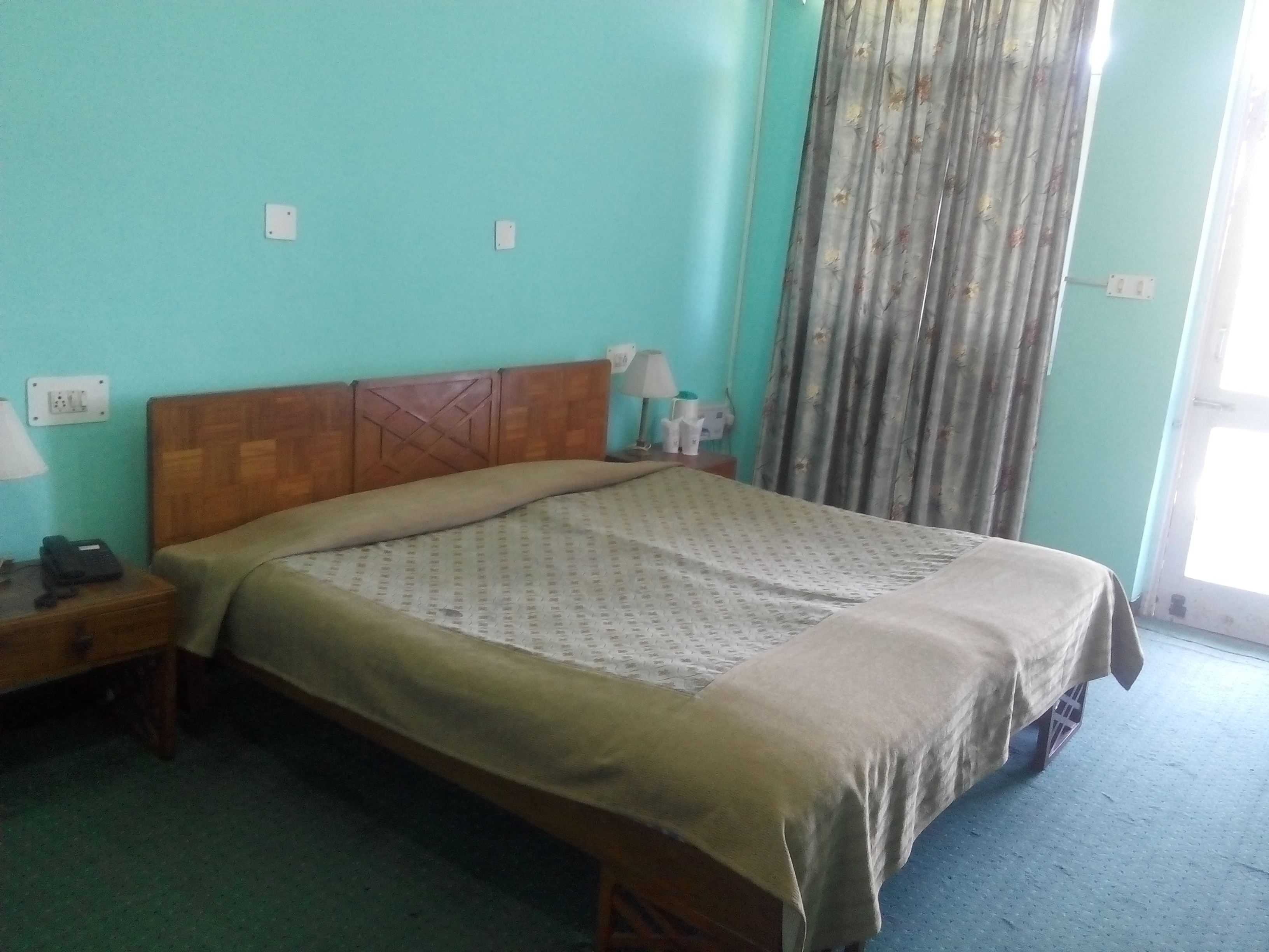 Hotel Dhauladhar, Dharamshala (HPTDC) - Tap to explore photos