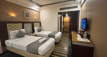 Dr. Rajkumar International Hotel Room Type - Premium Room with Balcony