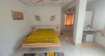 The New View Room Type - Sunny Orange Spacious Insta-Styled Luxury BedRoom