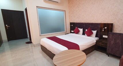AKASH HOTEL AND FARMS Room Type - DELUXE ROOM