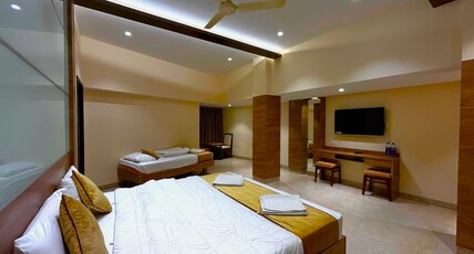 THE PARADISE HOTEL Room Type - PREMIUM TRIPLE BED AC