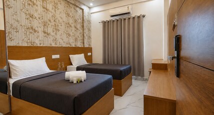 Z Express Aradhana Room Type - Deluxe Twin | AC Room