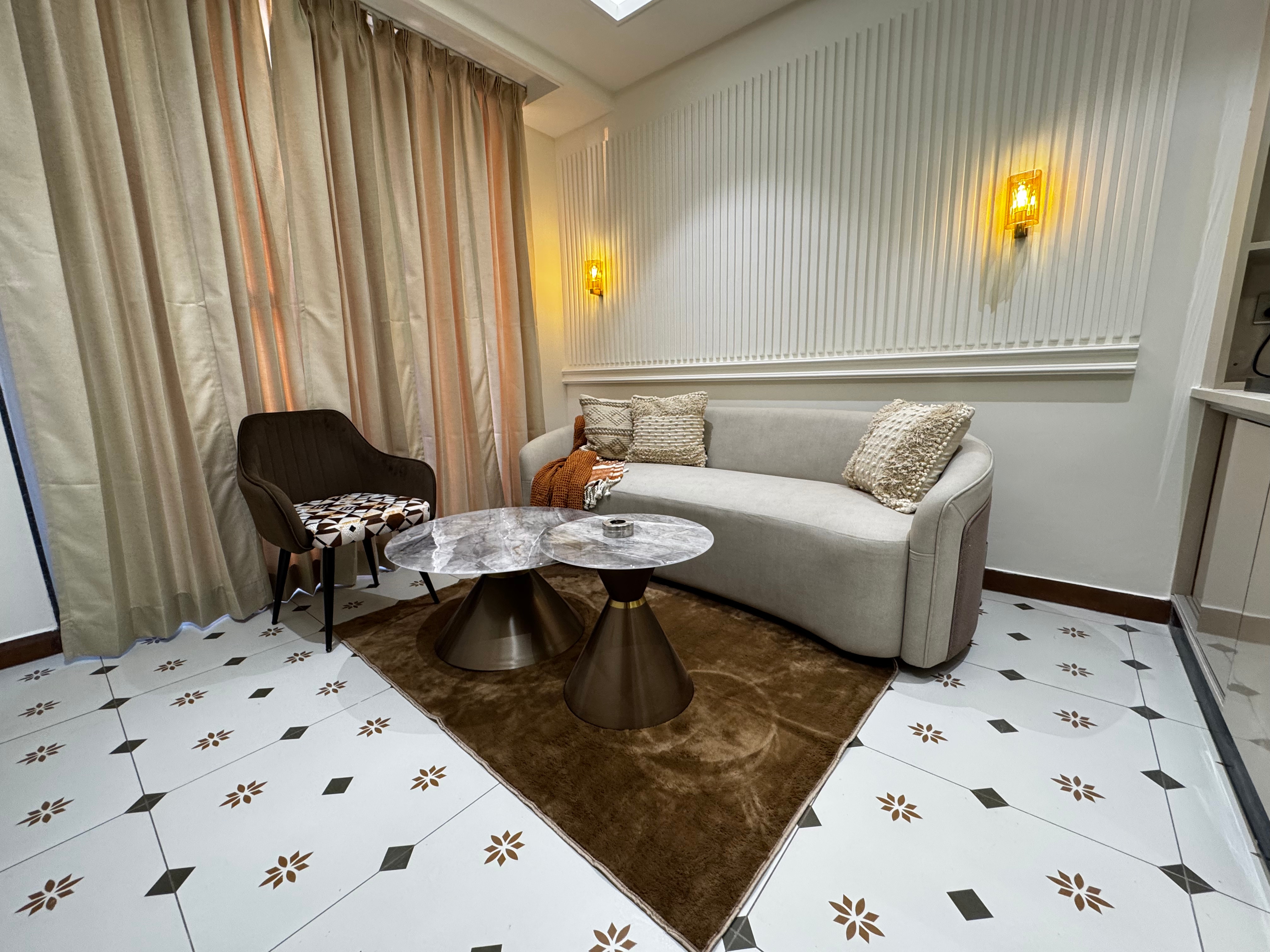 The Lodgers | 1BHK Apartment Near Ramada Sector 45 - Tap to explore photos