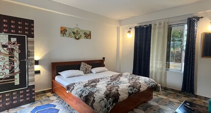 Pradhan Homestay Room Type - Room no 106 (Deluxe Room)
