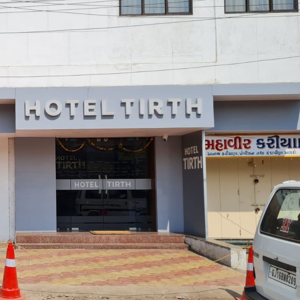 HOTEL TIRTH - Tap to explore photos