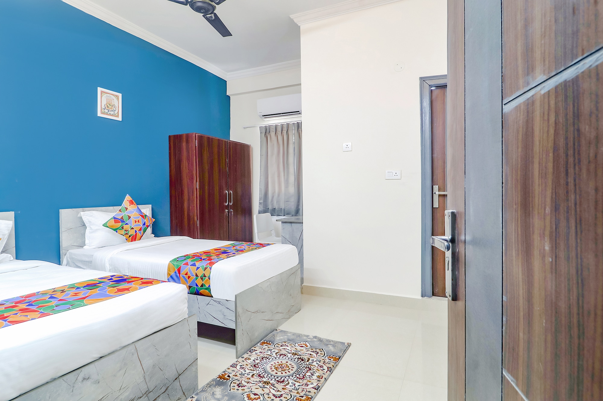 FabHotel Broholic Suites - U.S. Consulate - Tap to explore photos