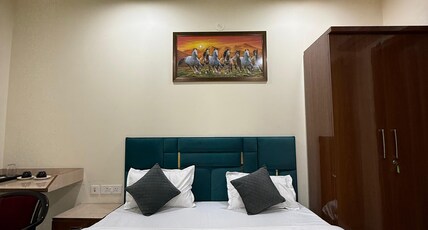 Abhinandan Room Type - Super Deluxe Master Bedroom