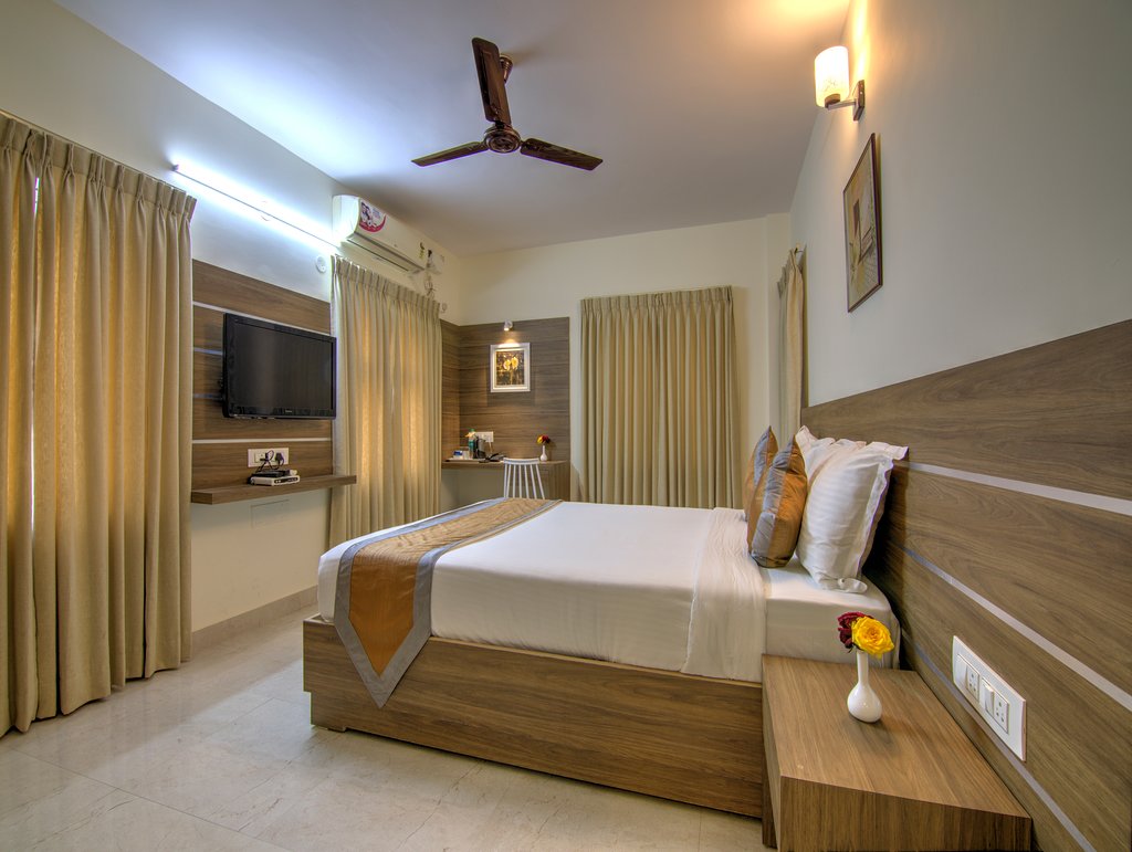 Sunshine Suites Grand Deluxe - Tap to explore photos