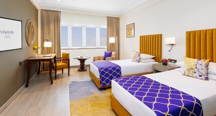 Vivanta Bengaluru, Residency Road Room Type - Deluxe Room Pool View Twin Bed