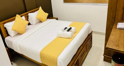 EMERALD INN Room Type - Deluxe Room (AC ROOM)
