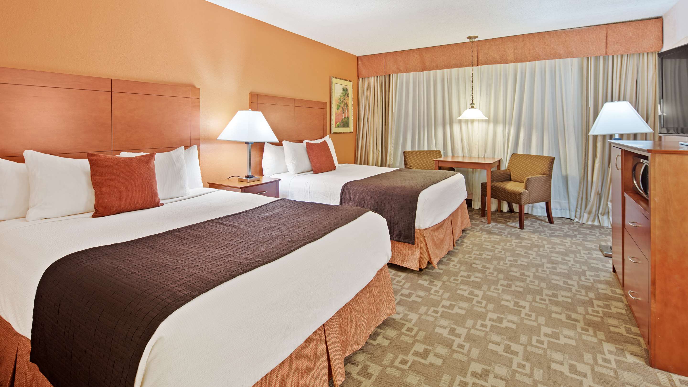 Best Western Plus University Inn - Tap to explore photos