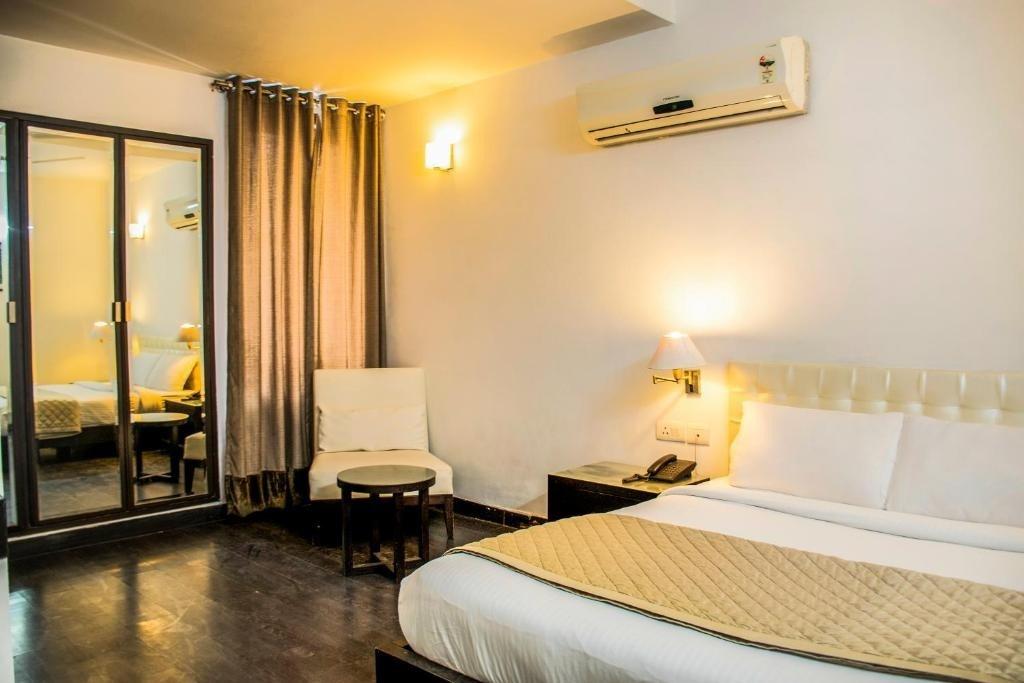 Hotel Grand Arcasia Saket 5 Mins from Max Hospital - Tap to explore photos