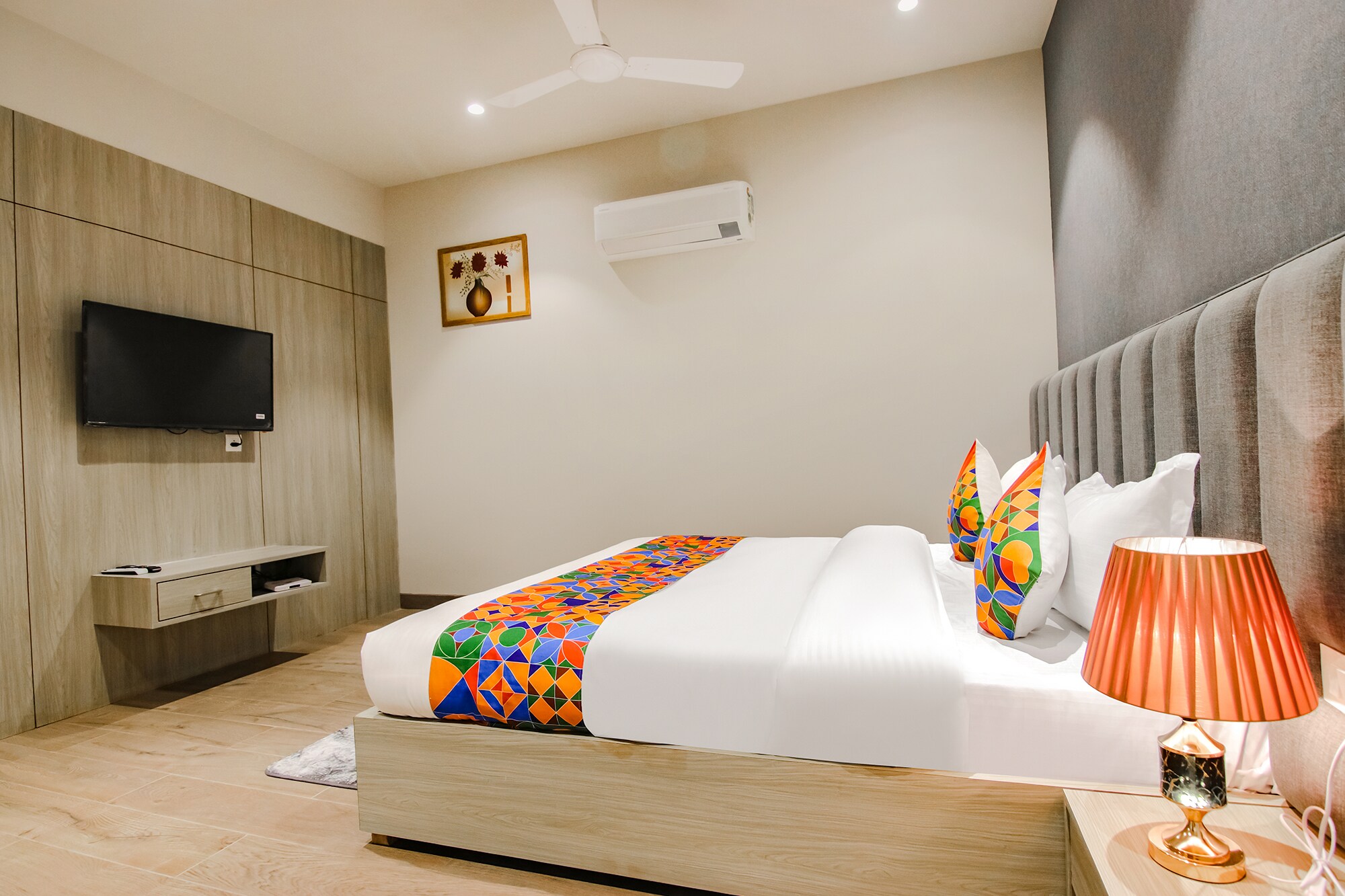 FabHotel Prime K9 Grand - Tap to explore photos
