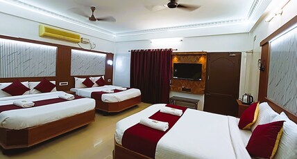 HOTEL JEYAM Room Type - DELUXE SIX - BED AC ROOM