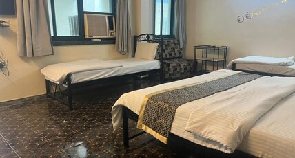 Hotel Sai's Village (101 meters from Saibaba Samadhi Temple) Room Type - Family Room Four Bed Deluxe Non AC