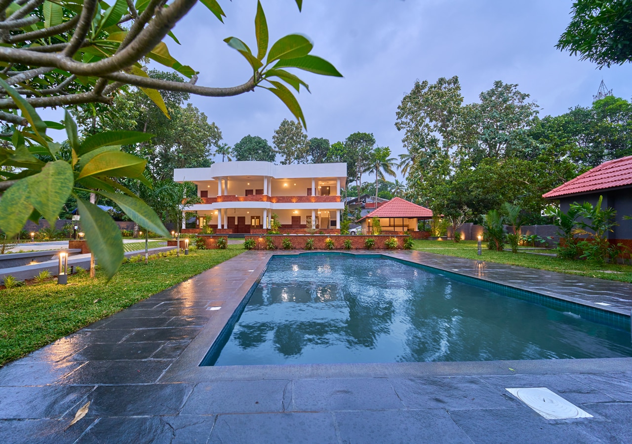 VOYE HOMES Signature Pool Resort Varkala - Tap to explore photos
