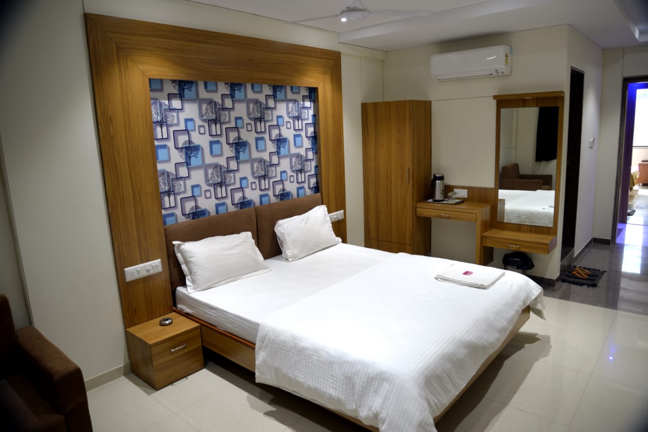 Hotel The New Holiday 3, Mehsana - Tap to explore photos