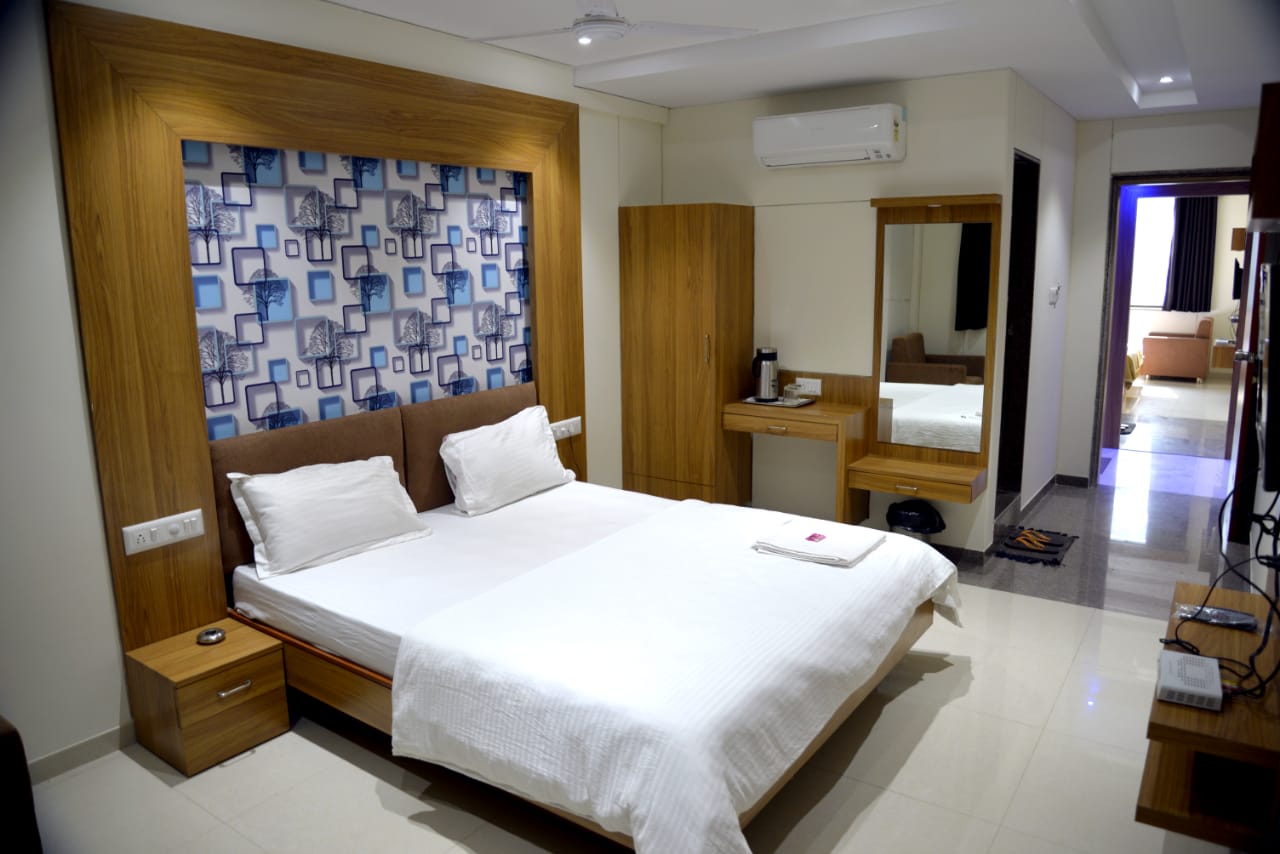 Hotel The New Holiday 3, Mehsana - Tap to explore photos