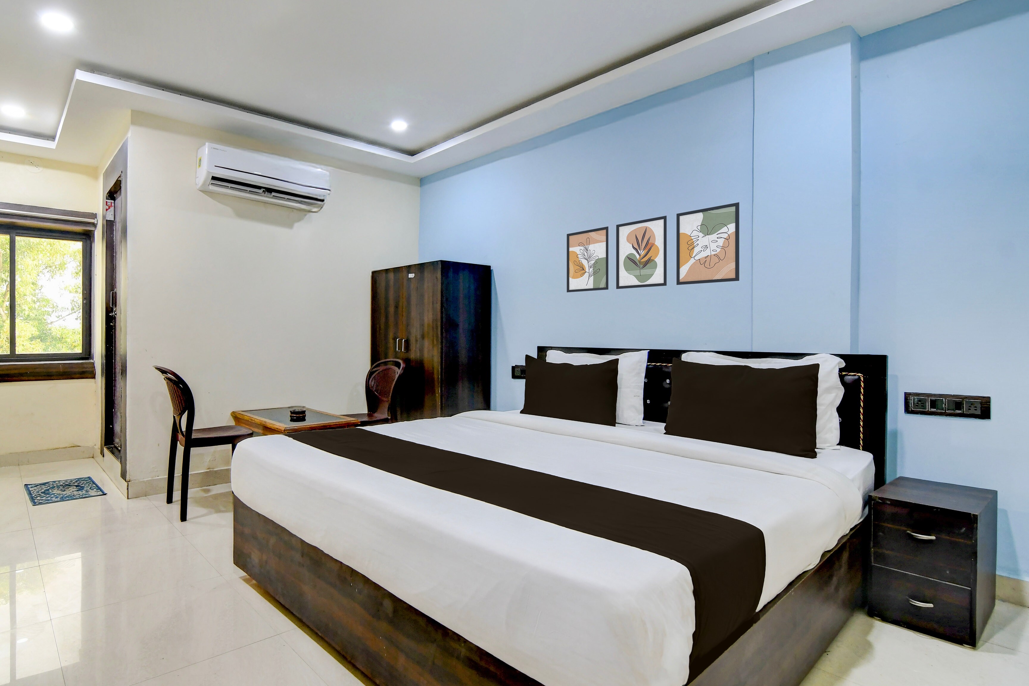 Hotel O S-Square - Tap to explore photos