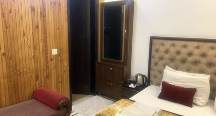 MEGHA HOMESTAY Room Type - Deluxe Room