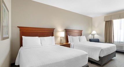 Best Western Plus Executive Hotel & Suites Room Type - 2 Queen Beds, Mobility Accessible, Bathtub, Non-Smoking, Full Breakfast Best Western Plus Executive Hotel & Suites Room Type - 2 Queen Beds, Mobility Accessible, Bathtub, Non-Smoking, Full Breakfast