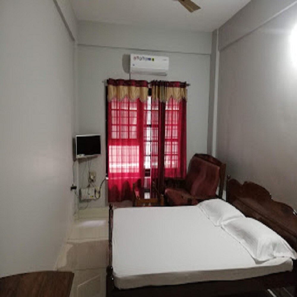 Sithara Tourist Home - Tap to explore photos