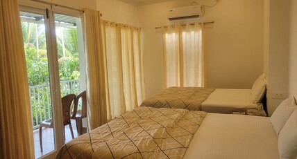 Evaans Casa Homestay | Lake-view Rooms Room Type - Twin bedded Lake n Paddy AC room
