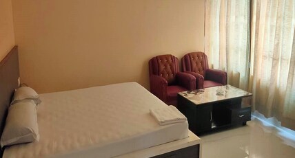 Hotel Star Hojai Room Type - Deluxe room