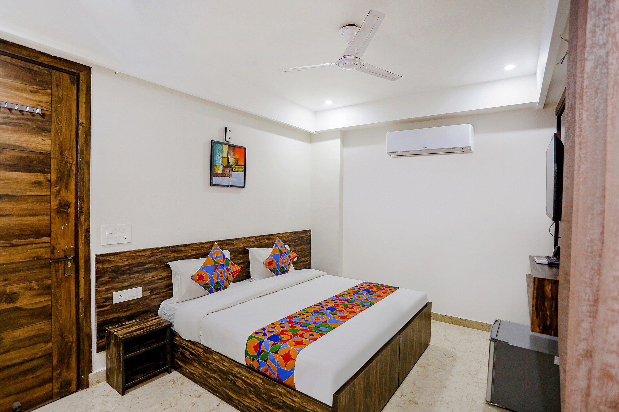 FabHotel Amrit Grand - Tap to explore photos