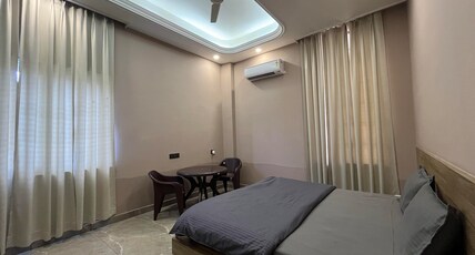 Anandam Homestay Room Type - Room with King Size Bed and Smart TV