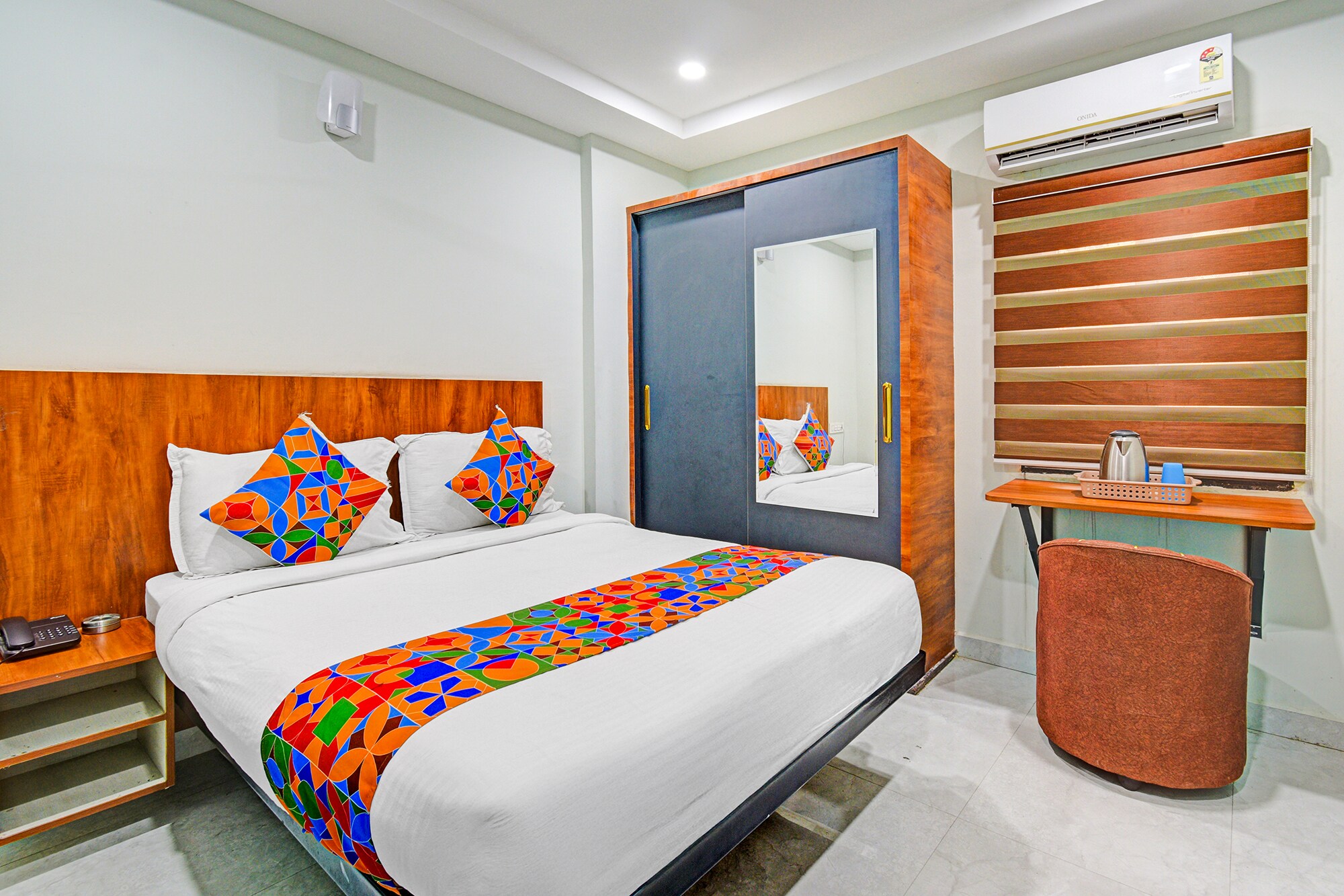 FabHotel New Srinika Premium - Tap to explore photos