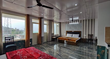 THE MOUNTAIN AND SUNRISE VIEW Room Type - Deluxe Room Double bed  with kitchen